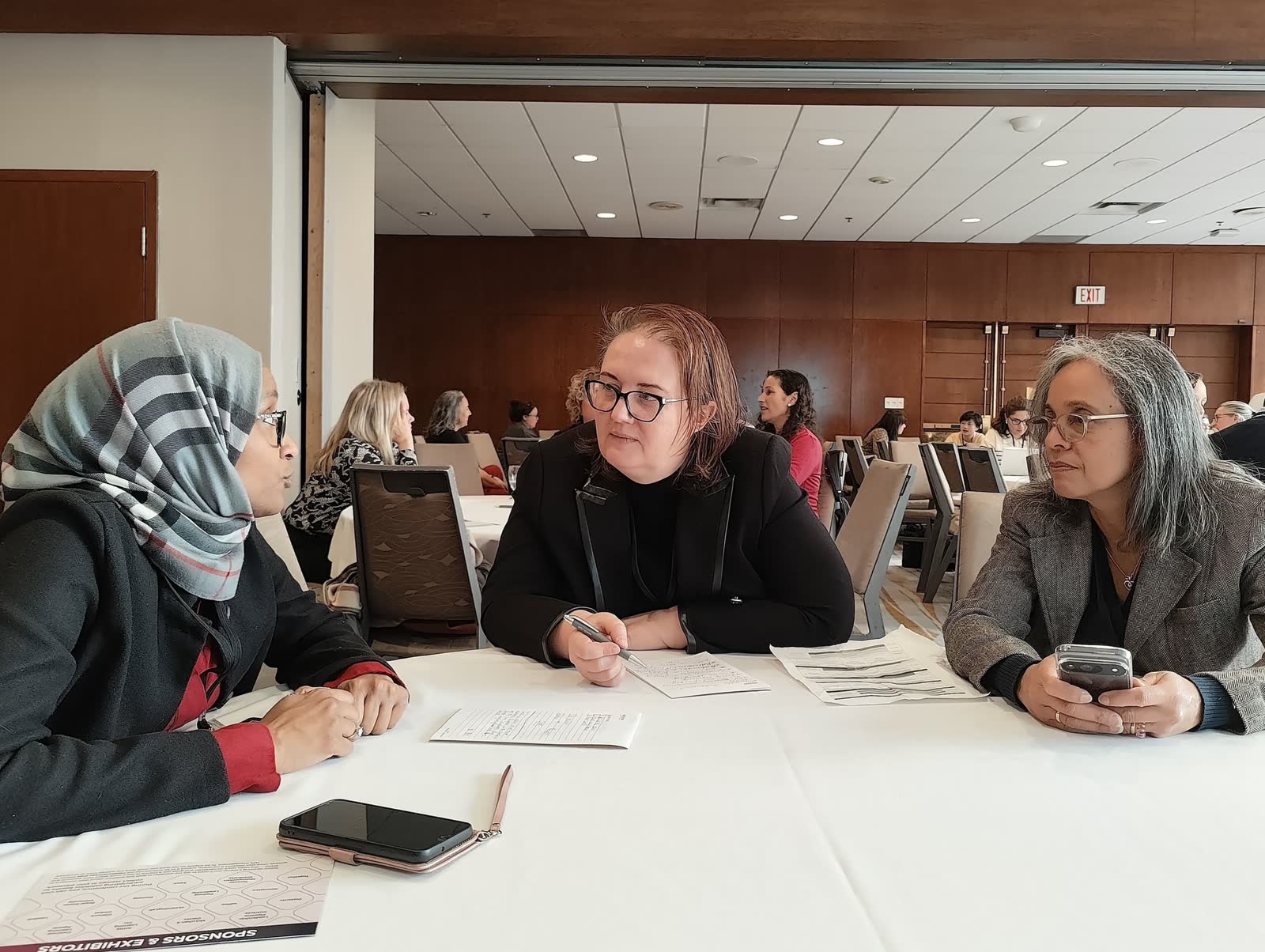 Delegates working together at an I4PL conference session