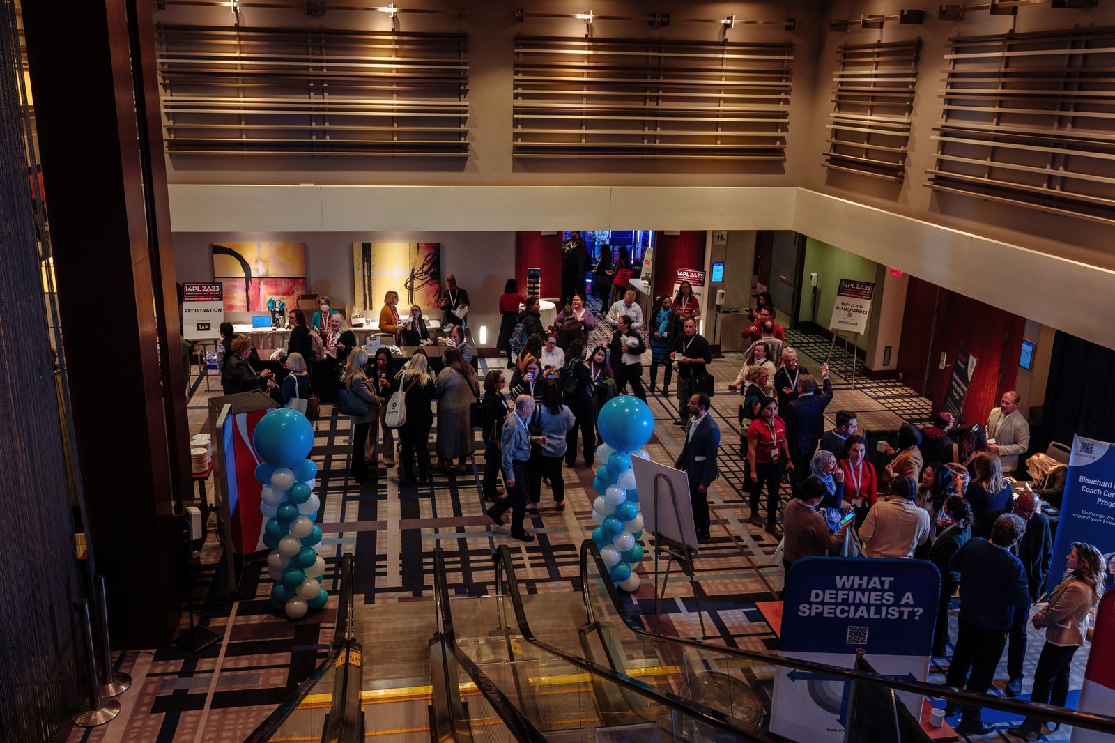 I4PL members networking on the conference floor between sessions.